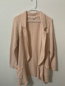 Pink knitted cardigan